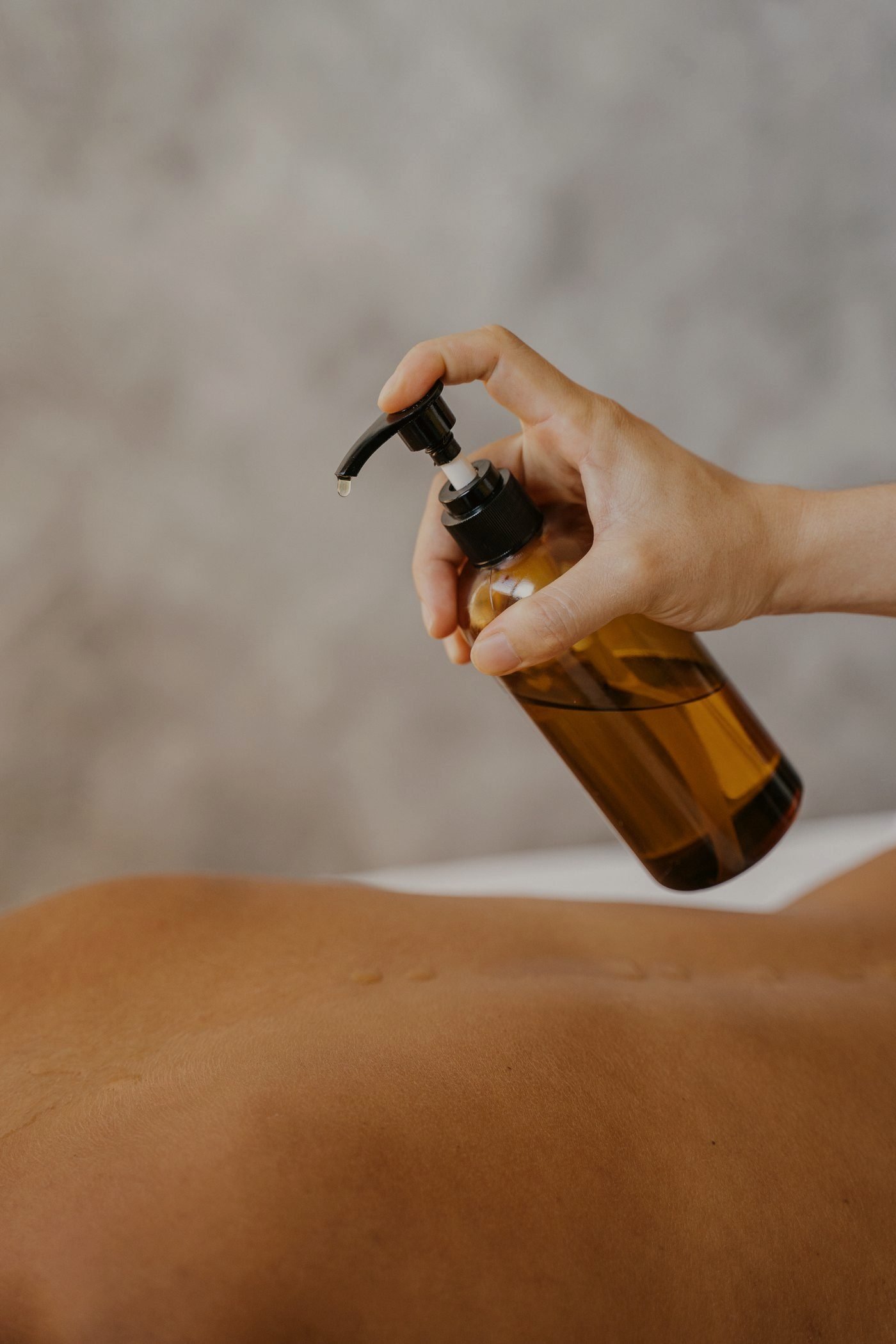 Relaxing massage oil on the back, Benidorm